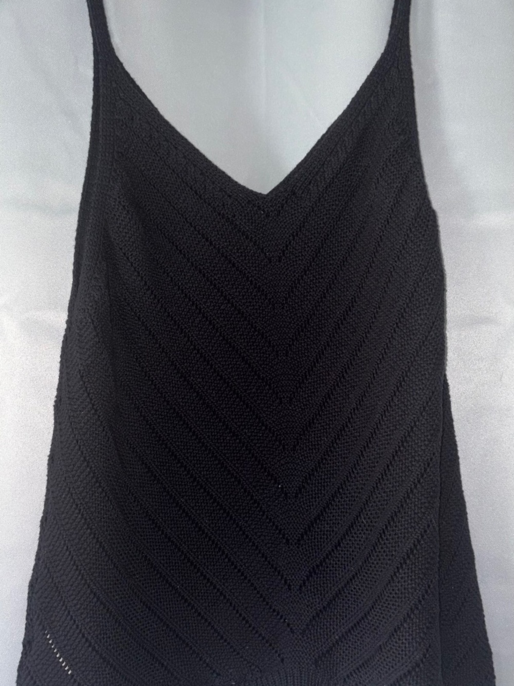 Black sleeveless knit sweater tank bought in boutique at the beach